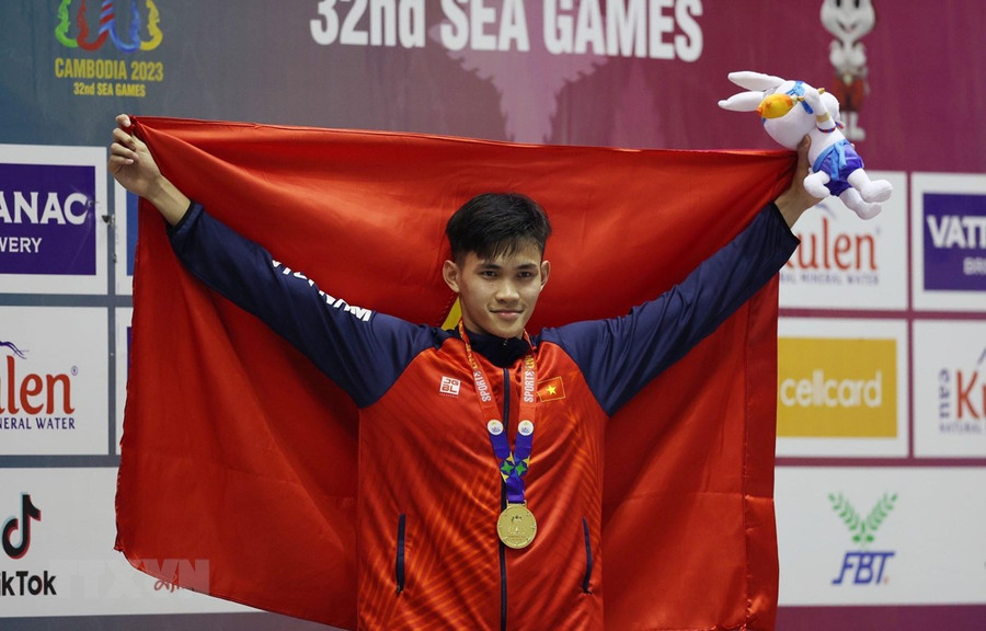 Phạm Thanh Bảo giành HCV, phá kỷ lục SEA Games. (Ảnh: Hoàng Linh/TTXVN) Phạm Thanh Bảo giành HCV, phá kỷ lục SEA Games. (Ảnh: Hoàng Linh/TTXVN)