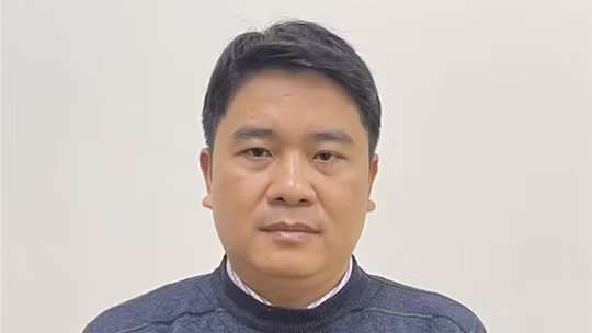 Bị cáo Trần Văn Tân khi bị bắt. Ảnh: Bộ Công an