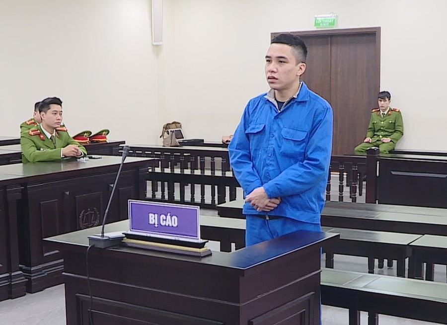 Bị cáo Trung nghe tuyên án sáng 29-12. Ảnh: ĐỖ TRUNG