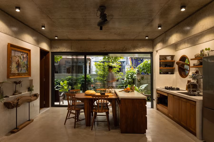 Không gian gia đình kết hợp phòng khách và bếp với đồ nội thất linh hoạt, khuyến khích sự tương tác giữa các thành viên trong gia đình, bạn bè và học sinh.