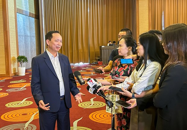 Phó Thống đốc NHNN Đào Minh Tú trả lời phỏng vấn báo chí. (Ảnh: PV/Vietnam+) Phó Thống đốc NHNN Đào Minh Tú trả lời phỏng vấn báo chí. (Ảnh: PV/Vietnam+)