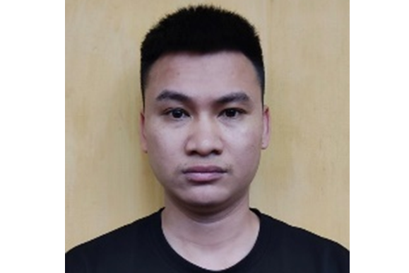 Đinh Văn Nhật tại cơ quan công an. Ảnh: HỮU THANH