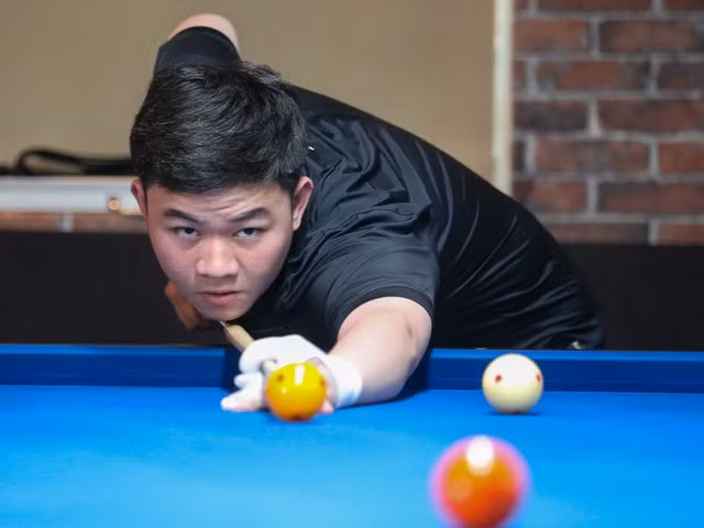 Bao Phương Vinh cũng giành vé đi tiếp. Ảnh: MINH TÂN