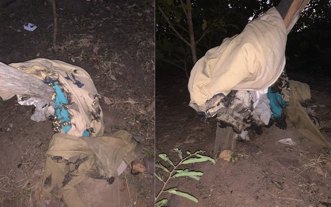 Quần áo bị thiêu sau khi mặt đất xuất hiện đám cháy. Quần áo bị thiêu sau khi mặt đất xuất hiện đám cháy.