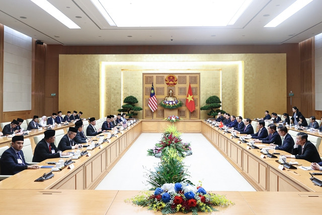 Hai Thủ tướng bày tỏ hài lòng về sự phát triển của quan hệ song phương thời gian qua, đặc biệt sau khi nâng cấp lên thành quan hệ Đối tác chiến lược năm 2015 - Ảnh: VGP/Nhật Bắc