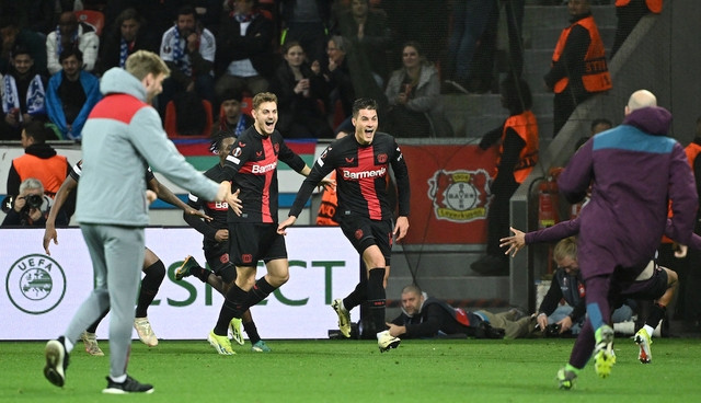 Leverkusen có màn ngược dòng ngoạn mục để duy trì thành tích bất bại ở mùa này. ẢNH: AFP Leverkusen có màn ngược dòng ngoạn mục để duy trì thành tích bất bại ở mùa này. ẢNH: AFP