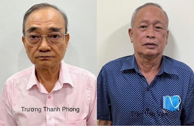 Đối tượng Trương Thanh Phong và Trần Văn Vẹn. (Ảnh: TTXVN phát)