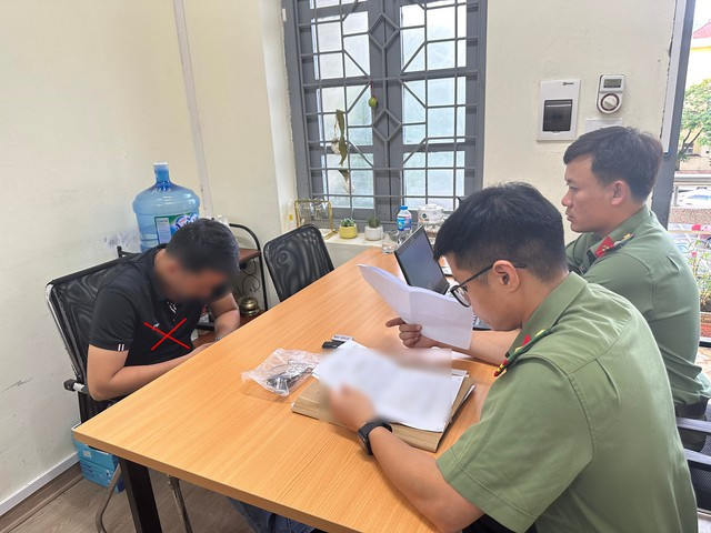 Công an làm việc với G. Ảnh Công an cung cấp