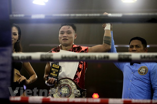 Võ Hồng Đạt giành đai WBA châu Á hạng nhẹ. (Ảnh: Thành Chung/Vietnam+)