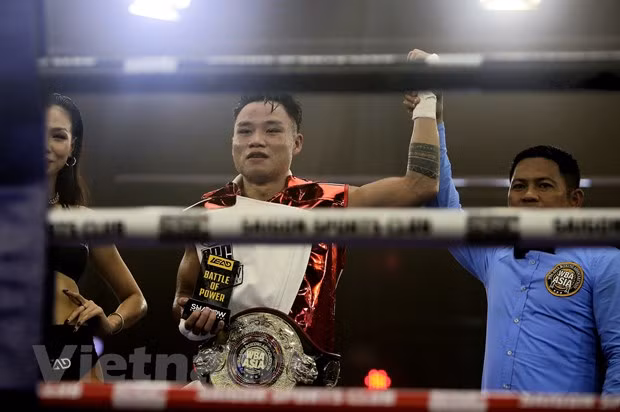 Võ Hồng Đạt giành đai WBA châu Á hạng nhẹ. (Ảnh: Thành Chung/Vietnam+) Võ Hồng Đạt giành đai WBA châu Á hạng nhẹ. (Ảnh: Thành Chung/Vietnam+)