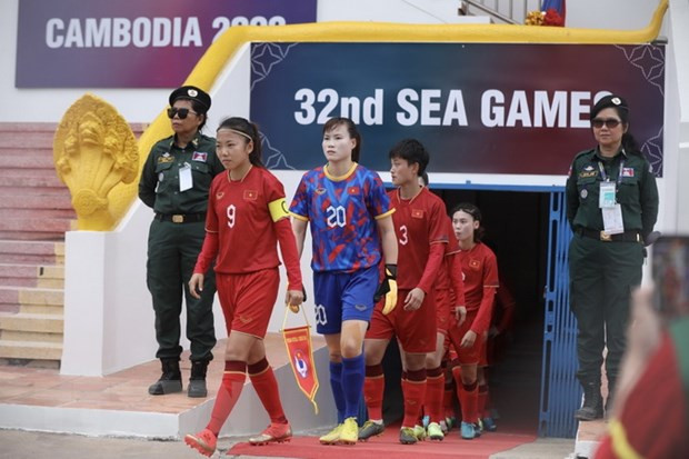 Huỳnh Như đeo băng đội trưởng trong trận ra quân của tuyển nữ Việt Nam gặp tuyển nữ Malaysia tại SEA Games 32. (Ảnh: Minh Quyết/TTXVN) Huỳnh Như đeo băng đội trưởng trong trận ra quân của tuyển nữ Việt Nam gặp tuyển nữ Malaysia tại SEA Games 32. (Ảnh: Minh Quyết/TTXVN)