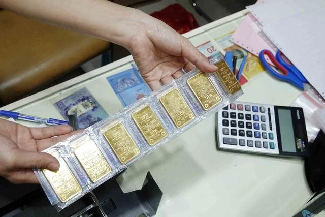 Giá vàng miếng SJC đột ngột tăng. Ảnh: NGỌC THẠCH