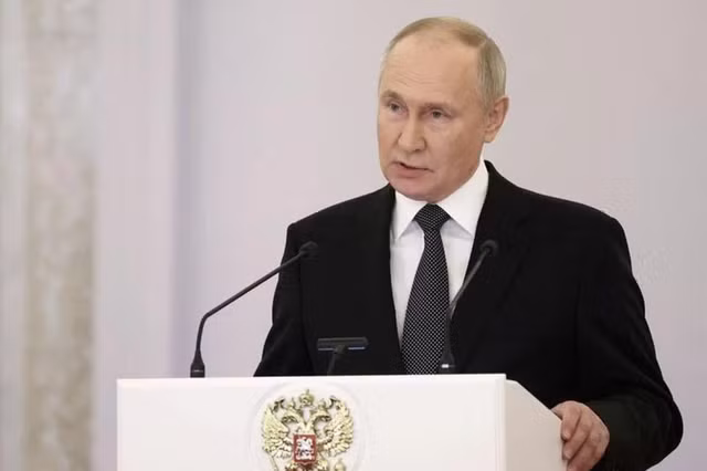 Tổng thống Putin xác nhận tái tranh cử trong bài phát biểu ngày 8-12. Ảnh: Reuters Tổng thống Putin xác nhận tái tranh cử trong bài phát biểu ngày 8-12. Ảnh: Reuters