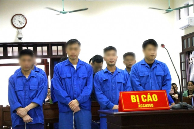 Các bị cáo tại phiên tòa ngày 27-3