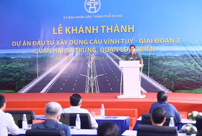 Thủ tướng Phạm Minh Chính phát biểu tại Lễ Khánh thành Cầu Vĩnh Tuy giai đoạn 2. (Ảnh: Dương Giang/TTXVN)