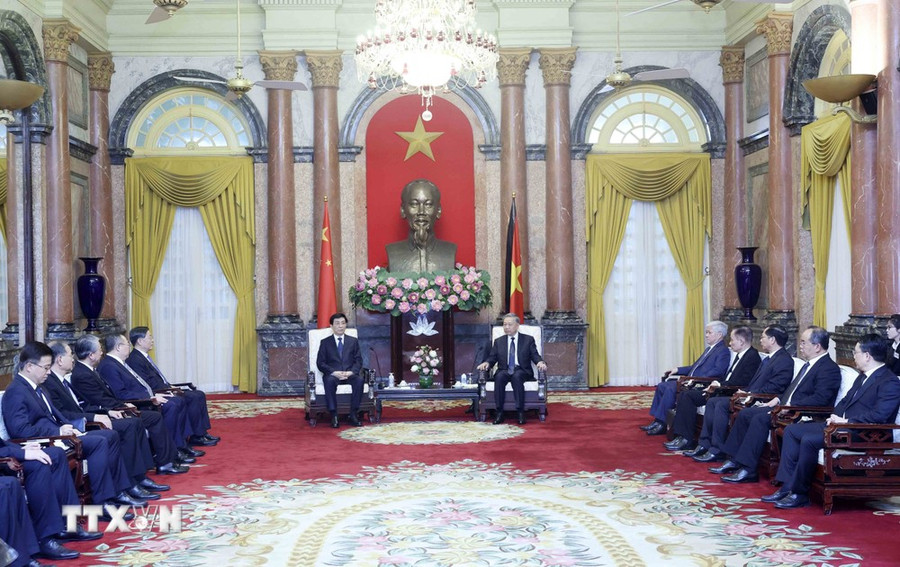 Chủ tịch nước Tô Lâm tiếp Chủ tịch Chính hiệp Trung Quốc Vương Hộ Ninh. (Ảnh: Nhan Sáng/TTXVN)