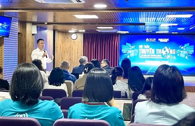 Đại diện trường ĐH nêu ý kiến về vấn đề đào tạo ngành báo chí-truyền thông. Ảnh MỸ QUYÊN