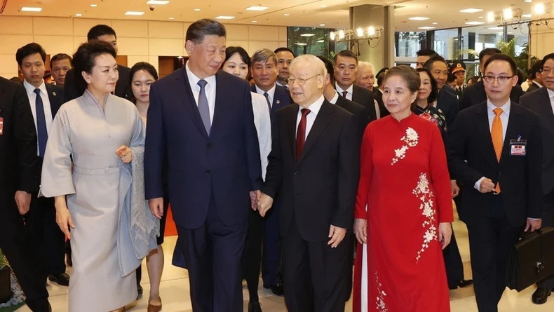 Tổng Bí thư Nguyễn Phú Trọng và Phu nhân cùng Tổng Bí thư, Chủ tịch Trung Quốc Tập Cận Bình và Phu nhân tại buổi gặp gỡ. (Ảnh: TTXVN)