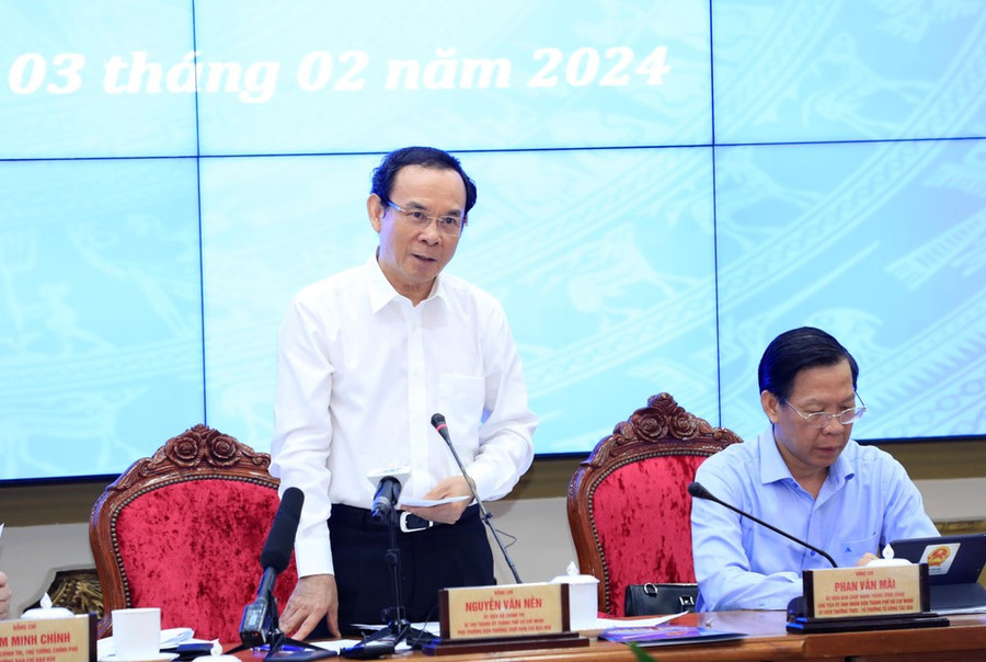 Bí thư Thành ủy Thành phố Hồ Chí Minh Nguyễn Văn Nên báo cáo. (Ảnh: Văn Điệp/TTXVN)