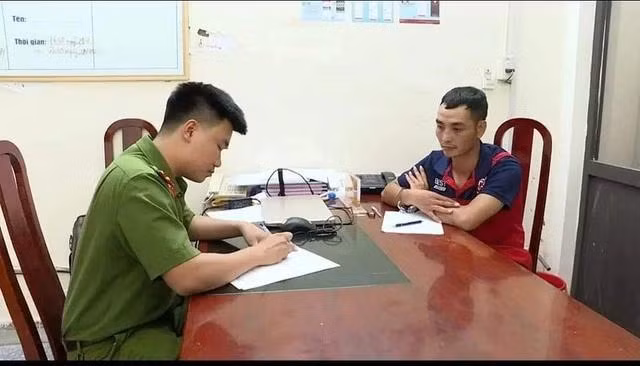 Dương Đức Trường tại cơ quan công an. Ảnh Đ.X