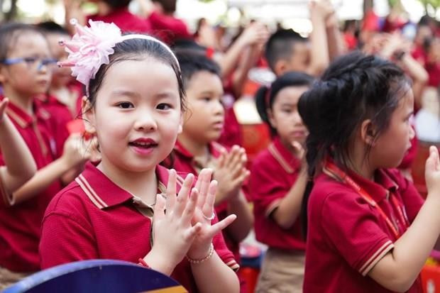 Niềm vui của học sinh trong ngày khai trường. (Ảnh: TTXVN) Niềm vui của học sinh trong ngày khai trường. (Ảnh: TTXVN)