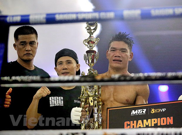 Võ sỹ Trần Quốc Tuấn thi đấu và giành chiến thắng ở hạng cân 68kg. (Ảnh: Thành Chung/Vietnam+) Võ sỹ Trần Quốc Tuấn thi đấu và giành chiến thắng ở hạng cân 68kg. (Ảnh: Thành Chung/Vietnam+)