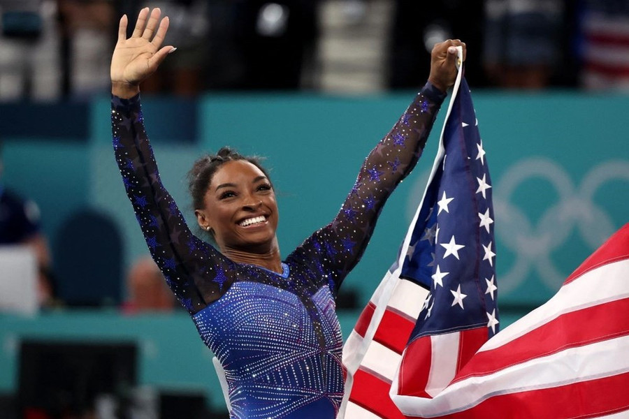 Simone Biles giúp Đoàn Mỹ bứt tốc lên top 2. (Nguồn: Reuters) Simone Biles giúp Đoàn Mỹ bứt tốc lên top 2. (Nguồn: Reuters)