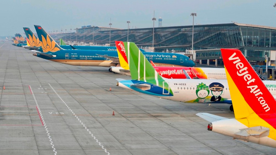 Máy bay của các hãng hàng không Việt Nam tại Sân bay Quốc tế Nội Bài. (Ảnh: PV/Vietnam+) Máy bay của các hãng hàng không Việt Nam tại Sân bay Quốc tế Nội Bài. (Ảnh: PV/Vietnam+)