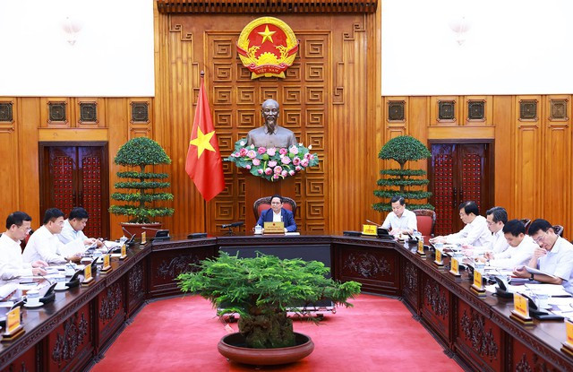 Thủ tướng Phạm Minh Chính chủ trì cuộc họp về chính sách tiền tệ, chính sách tài khóa. Ảnh: VGP/Nhật Bắc