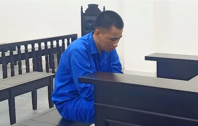 Bị cáo Nguyễn Quốc Việt tại phiên toà. Ảnh: T.N.