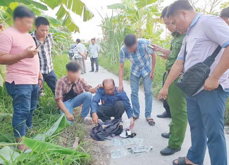 Đối tượng Lê Minh Trang cùng tang vật. Ảnh: Thế Phong