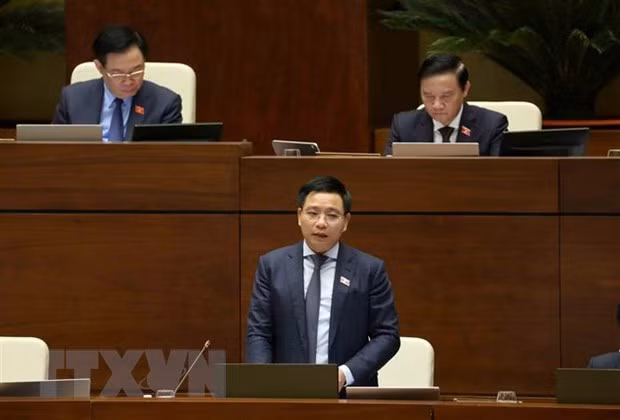 Bộ trưởng Bộ Giao thông Vận tải Nguyễn Văn Thắng trả lời chất vấn. (Ảnh: An Đăng/TTXVN)