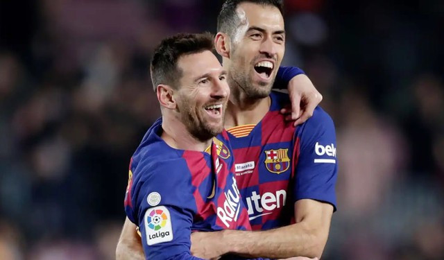 Messi và Sergio Busquets từng có nhiều năm thi đấu tại CLB Barcelona. Ảnh: AFP