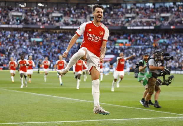 Niềm vui của Arsenal sau chiến thắng. (Nguồn: Reuters)