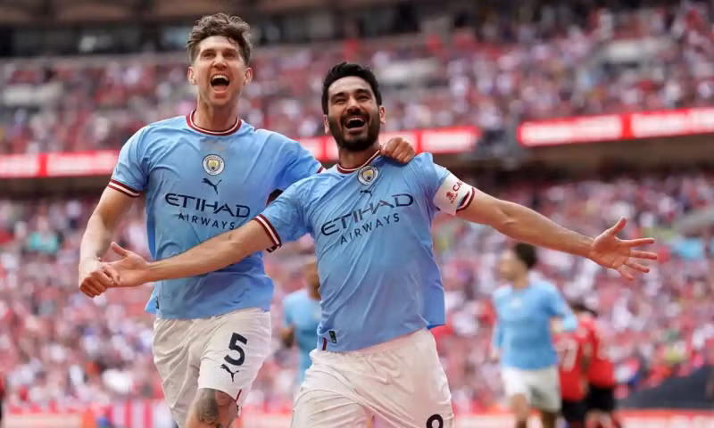 Ilkay Gundogan lập một cú đúp giúp Man City vượt qua MU trong trận chung kết Cup FA. Ảnh: PA.