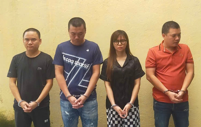 Trần Hoàng Minh, Ngụy Phan Kiên, Nguyễn Lan Anh và Hoàng Trọng Cường (từ trái qua phải) trong đường dây lừa đảo, rửa tiền xuyên quốc gia. Ảnh: Công an Thanh Hóa