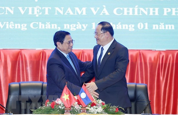 Thủ tướng Phạm Minh Chính và Thủ tướng Lào Sonexay Siphandone tại lễ ký kết Biên bản Kỳ họp lần thứ 45 Ủy ban liên Chính phủ Việt Nam-Lào. (Ảnh: Dương Giang/TTXVN) Thủ tướng Phạm Minh Chính và Thủ tướng Lào Sonexay Siphandone tại lễ ký kết Biên bản Kỳ họp lần thứ 45 Ủy ban liên Chính phủ Việt Nam-Lào. (Ảnh: Dương Giang/TTXVN)