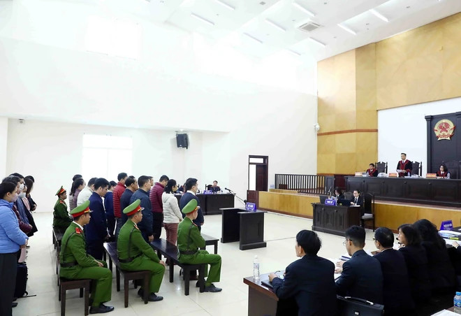 Quang cảnh phiên tòa. (Ảnh: Phạm Kiên/TTXVN) Quang cảnh phiên tòa. (Ảnh: Phạm Kiên/TTXVN)