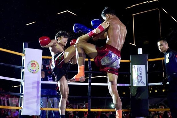 Võ sỹ Nguyễn Trần Duy Nhất - găng đỏ - trong trận tranh đai vô địch IPCC hạng 60kg Nam với võ sỹ người Thái Lan Chaiwat Sungnoi - găng xanh. (Ảnh: Thanh Vũ/TTXVN) Võ sỹ Nguyễn Trần Duy Nhất - găng đỏ - trong trận tranh đai vô địch IPCC hạng 60kg Nam với võ sỹ người Thái Lan Chaiwat Sungnoi - găng xanh. (Ảnh: Thanh Vũ/TTXVN)