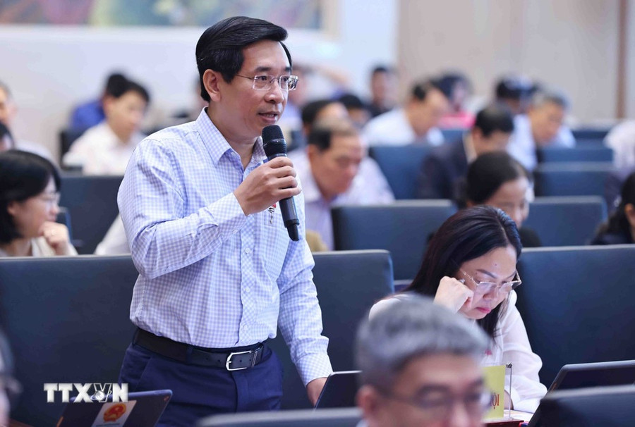 Đại biểu Quốc hội tỉnh Bình Định Nguyễn Văn Cảnh phát biểu tại hội nghị. (Ảnh: Minh Đức/TTXVN) Đại biểu Quốc hội tỉnh Bình Định Nguyễn Văn Cảnh phát biểu tại hội nghị. (Ảnh: Minh Đức/TTXVN)