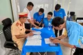 Tài xế của Công ty Cổ phần vận tải và du lịch LADO tại phường Bồng Sơn ký cam kết tuân thủ Luật Trật tự, an toàn giao thông đường bộ. 