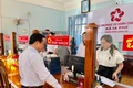 Phó Chủ tịch Thường trực UBND tỉnh Nguyễn Tuấn Thanh động viên đội ngũ cán bộ Trung tâm Phục vụ hành chính công xã Ia Phí. Ảnh: Ngọc Luận