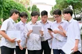 Thí sinh tại điểm thi Trường THPT Lê Lợi (TP. Pleiku) trao đổi về đề thi môn Toán. Ảnh: Đ.T