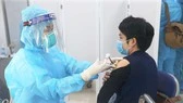 Tác dụng phụ sau tiêm vaccine Covid-19 là phản ứng thông thường