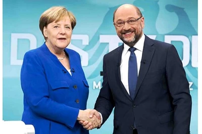 Đức: Bà Merkel nhượng bộ, EU trút được gánh nặng