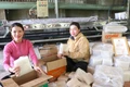 Làm giàu từ hạt gạo quê hương. Ảnh: Ngọc Minh