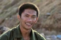 Anh Nguyễn Hùng vào vai người lính trong phim “Mưa đỏ” (ảnh nhân vật cung cấp).