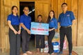 Đoàn UBND tỉnh Gia Lai tặng công trình Nhà nhân ái cho hộ nghèo tại xã An Toàn ngày 24-5. Ảnh: D.L