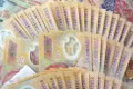 Cảnh báo tiền giả mới mệnh giá 100.000 và 200.000 đồng