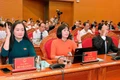 Các đại biểu biểu quyết thông qua 19 nghị quyết quan trọng. Ảnh: Đức Thụy